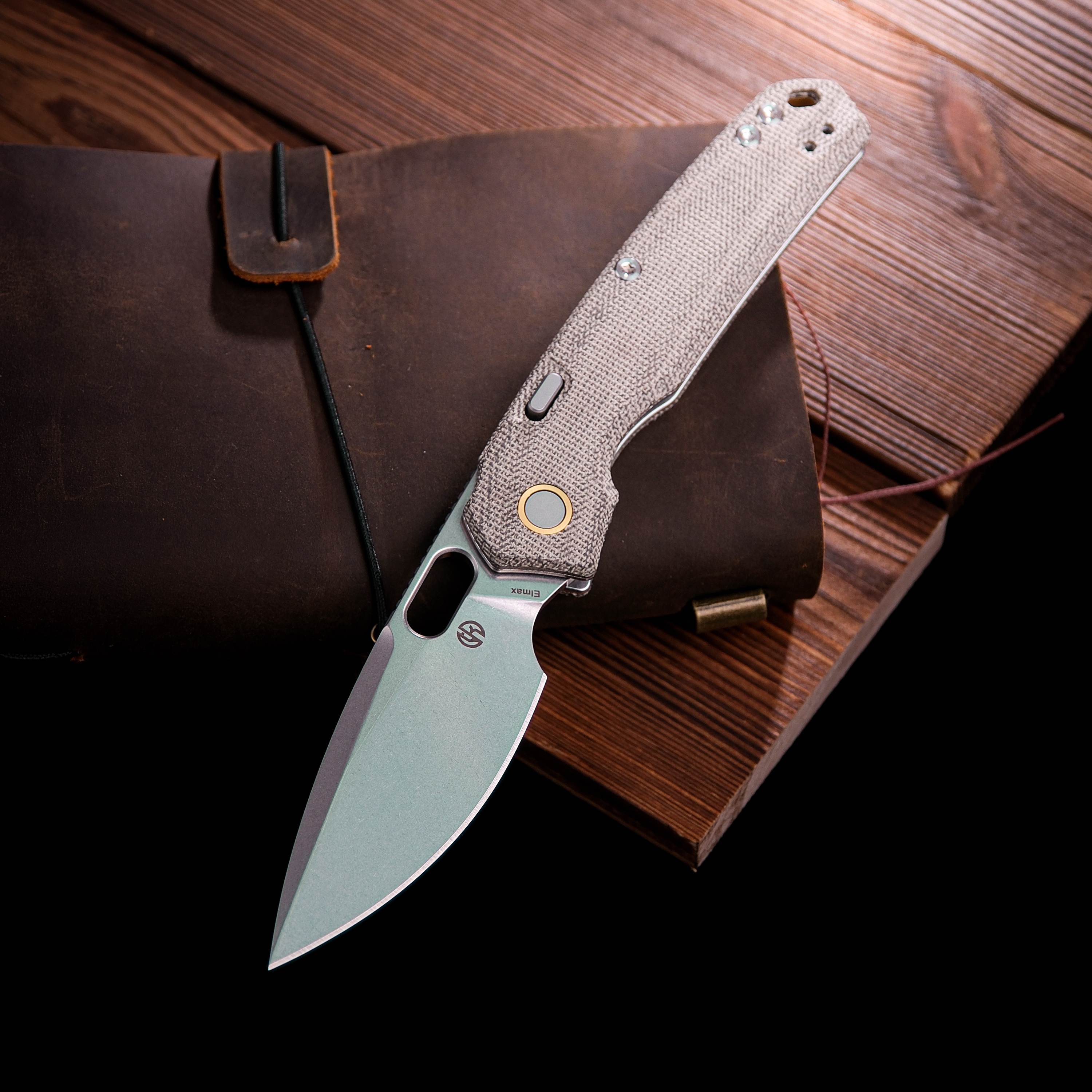 Vosteed Psyop knife with Elmax blade and Micarta handle