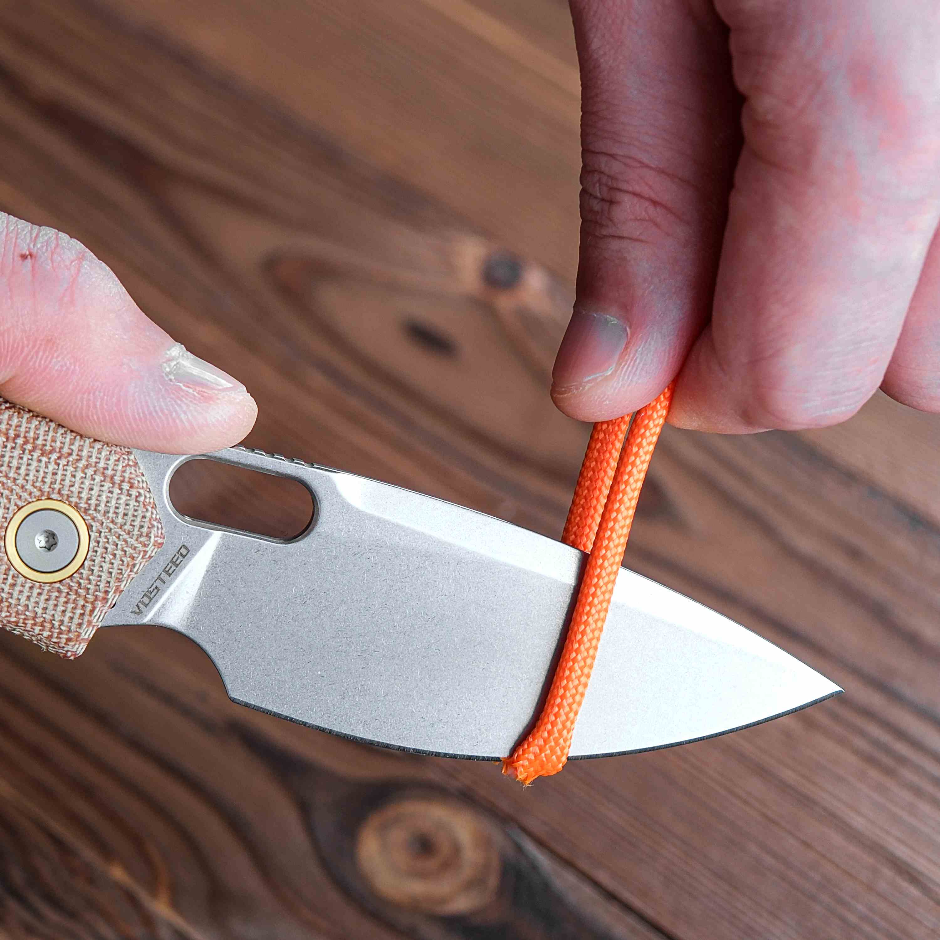 Vosteed Psyop knife cutting rope, Elmax blade