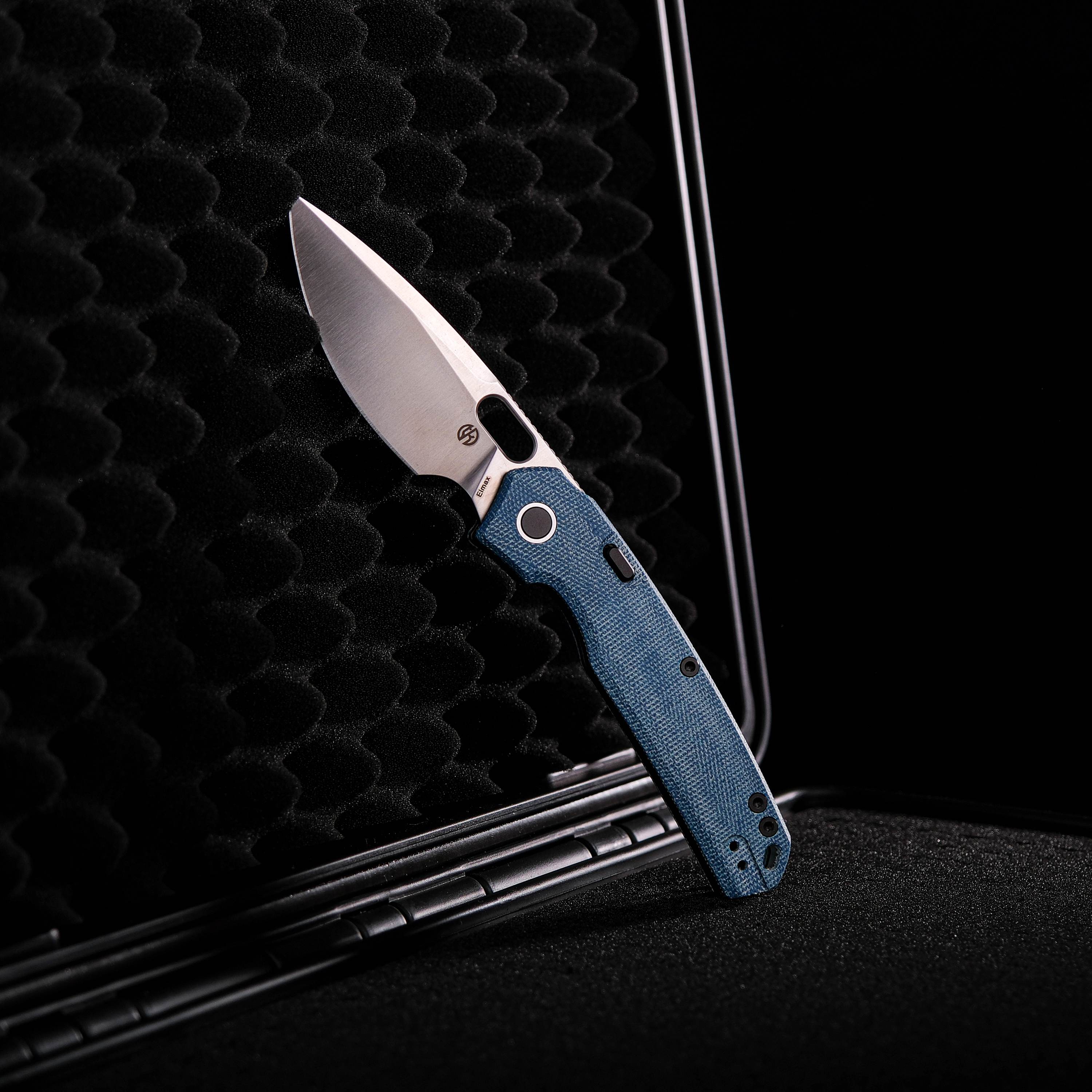 Vosteed Psyop knife with blue Micarta handle, Elmax blade