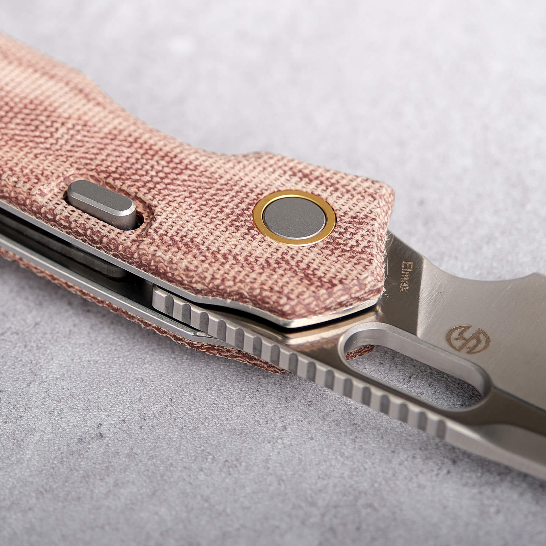 Vosteed Psyop knife detail, red Micarta handle, Elmax blade