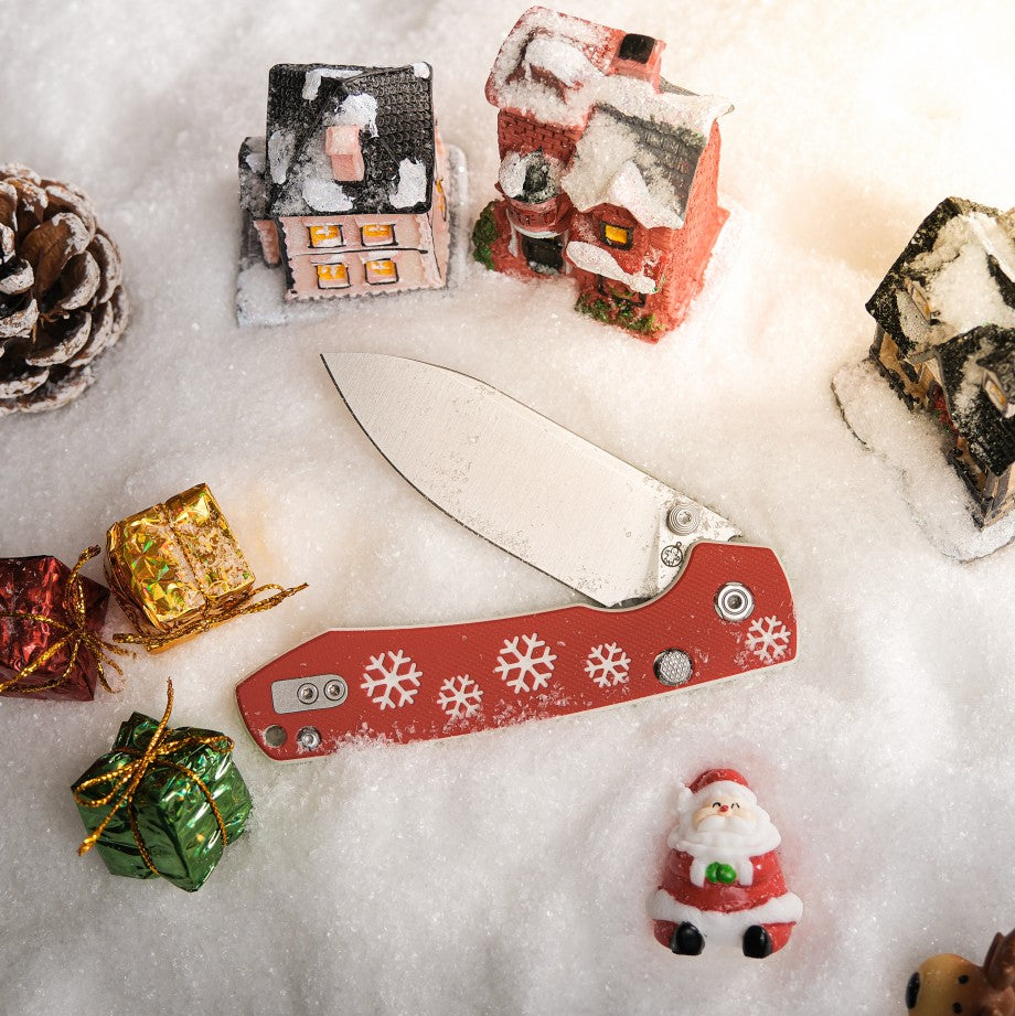 Vosteed Raccoon Christmas knife with snowflake design on snow, holiday theme