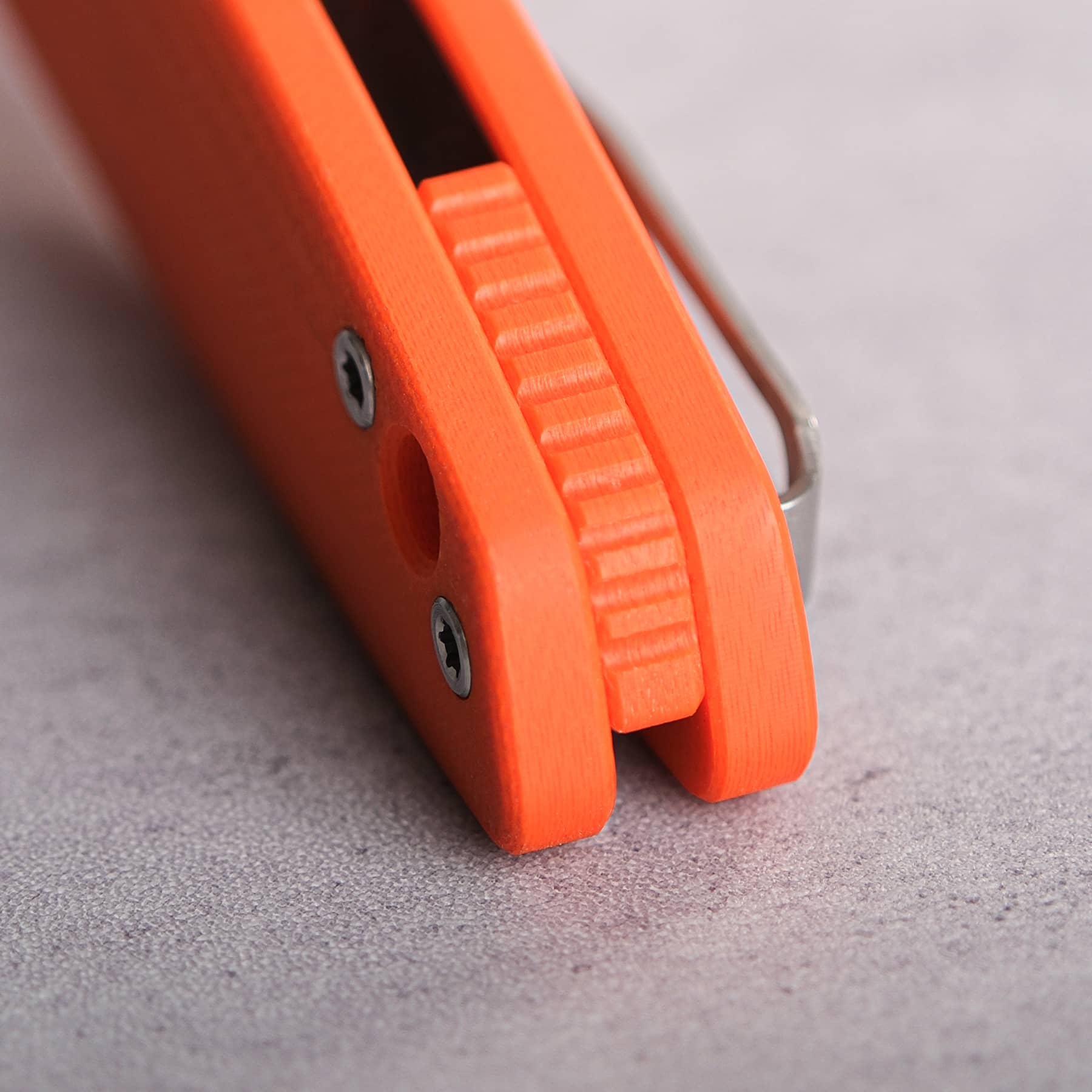 Vosteed Shilin Cutter® Vanchor Lock® detail, orange G10 handle