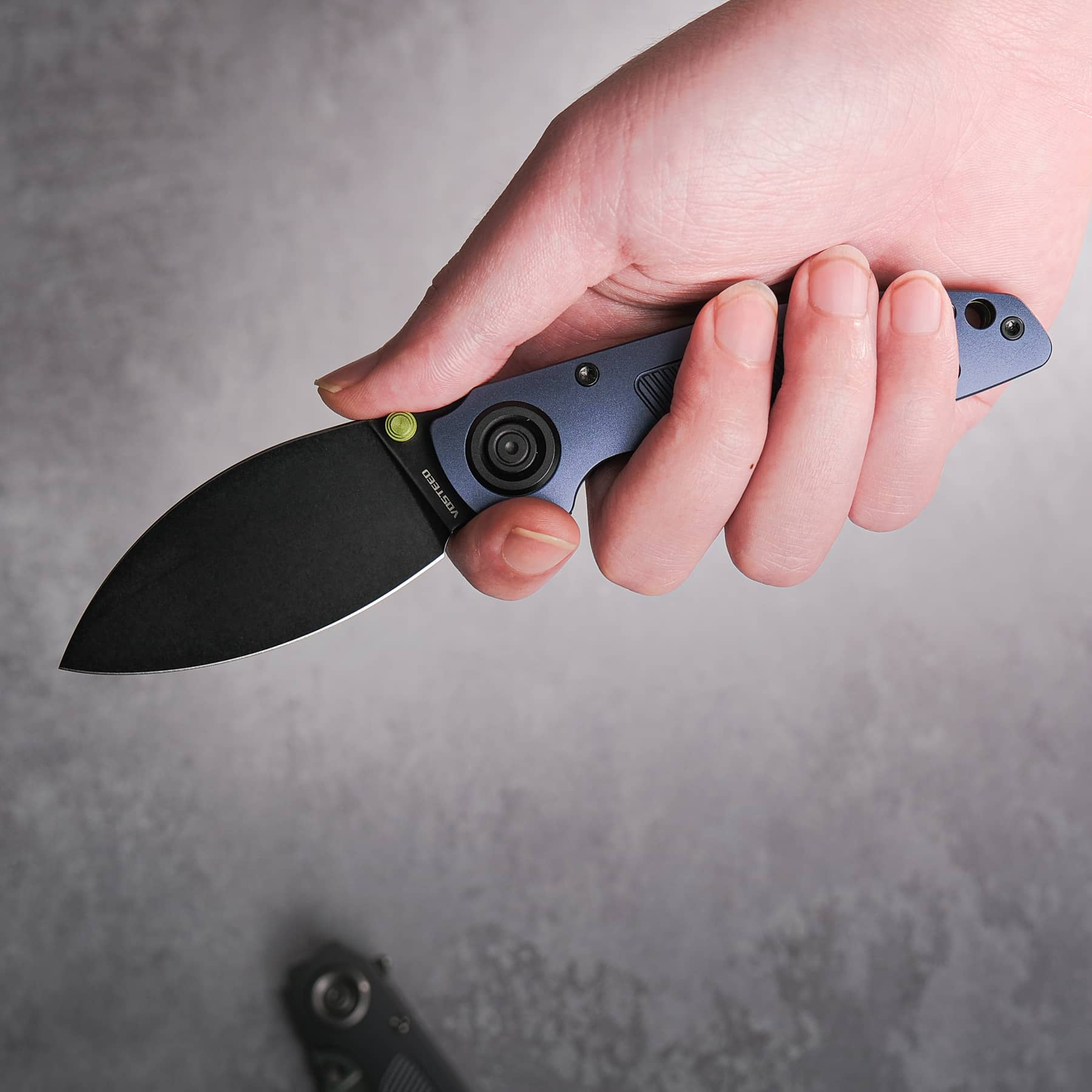 Vosteed Shilin Cutter® with Elmax blade, held in hand