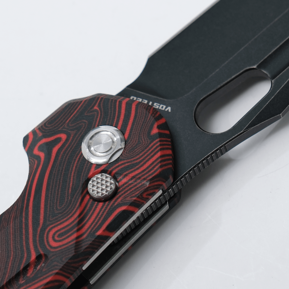 Vosteed Thunderbird Knife - Close-up Trek Lock and Red Handle Detail