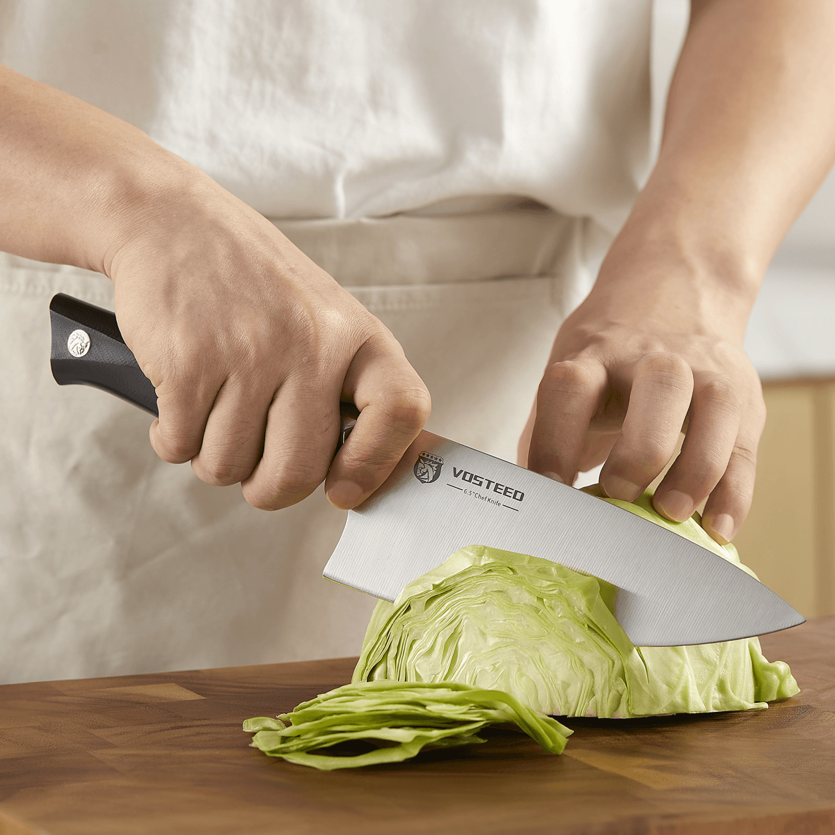 Vosteed Stallion I Chef's Knife slicing cabbage