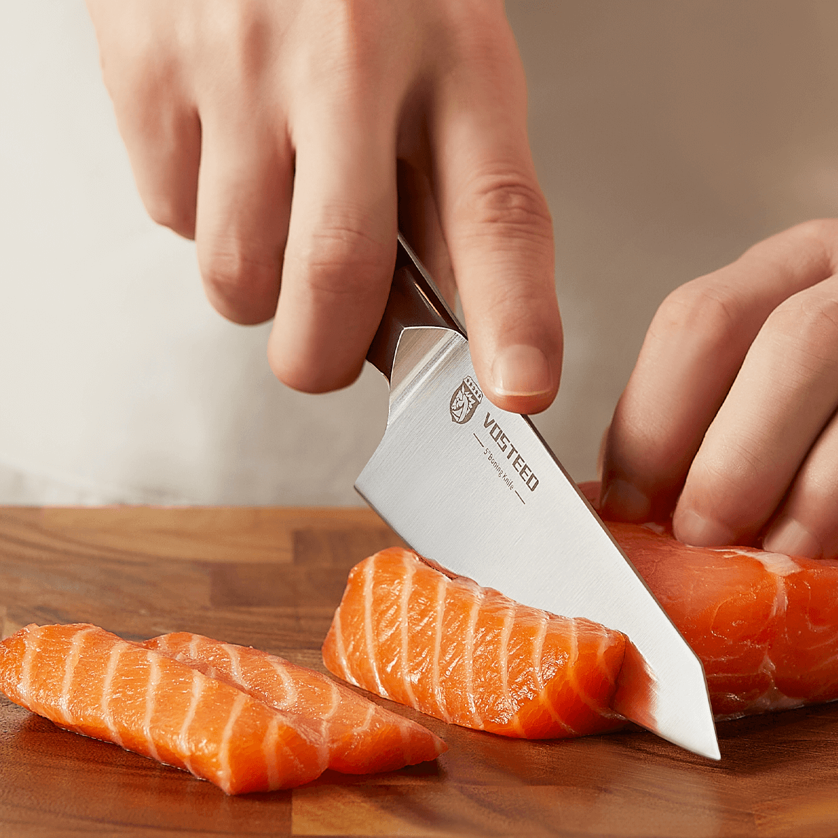 Vosteed Stallion Boning Knife slicing salmon