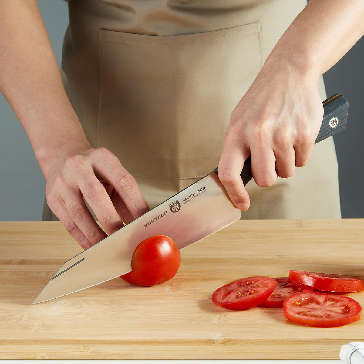 Vosteed Hackney Chef Knife slicing tomato