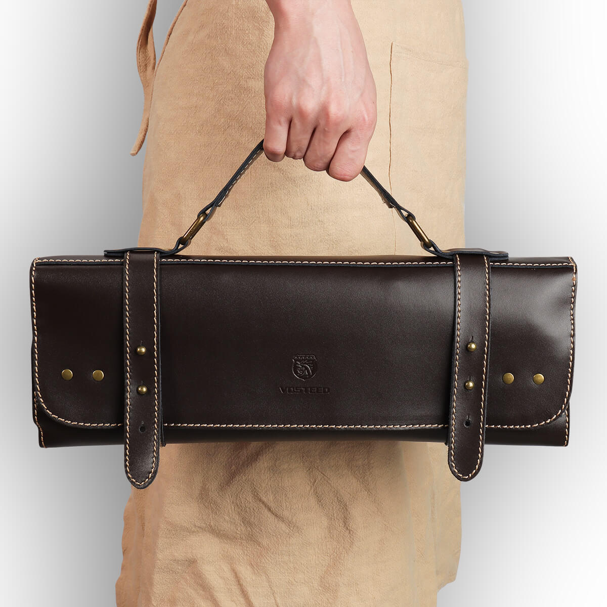 Vosteed leather knife roll bag held by hand