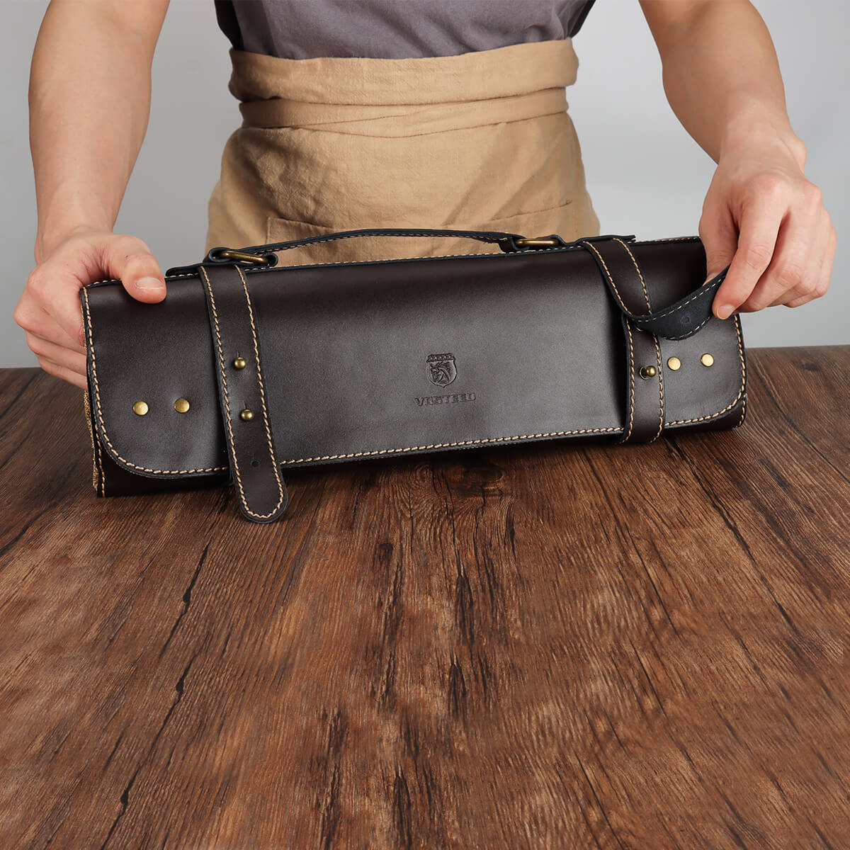 Vosteed Leather Knife Roll Bag on Wooden Surface