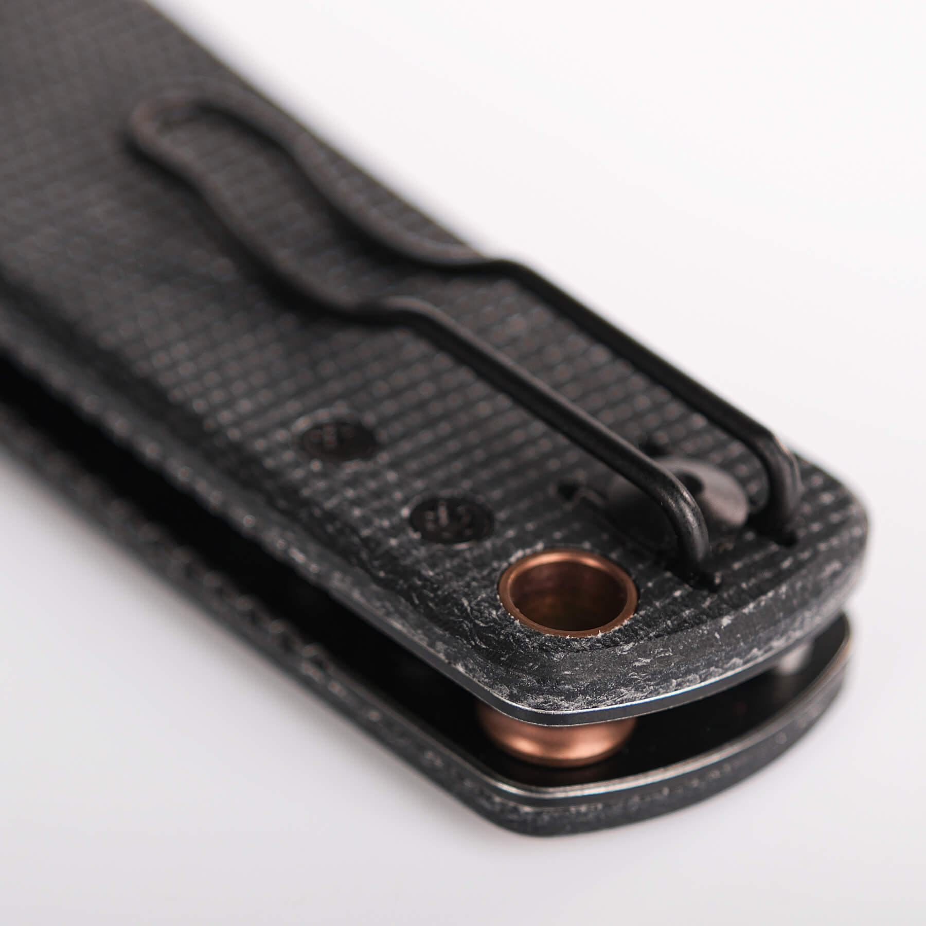 Vosteed Porcupine knife, pocket clip, micarta handle detail
